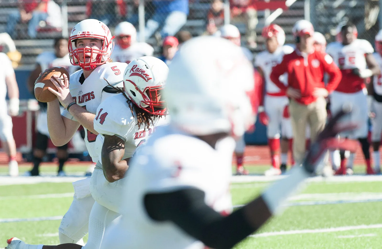 Football players in action on the field
